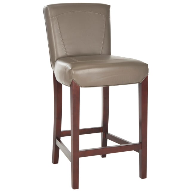 Choose the Barstool for luxurious comfort at the kitchen counter or bar. Upholstered in clay-toned bicast leather with...