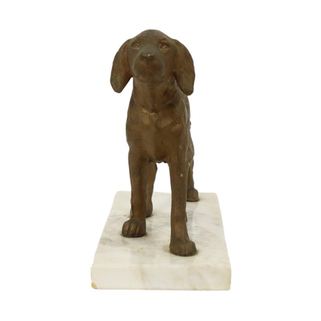 Nice figurine of a dog standing on a rectangular marble base; the sculpture is made of a zinc alloy, popularly known as...