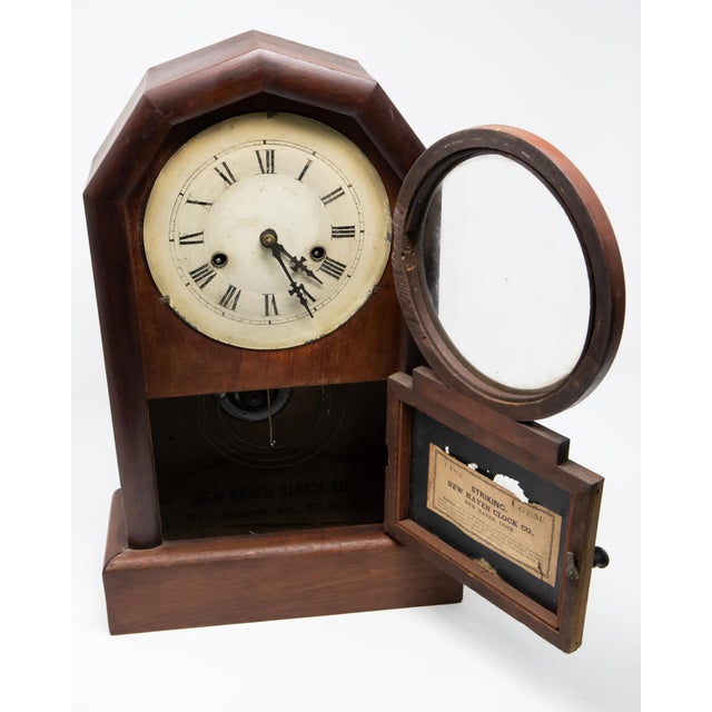 Mantle clock by New Haven Clock Co. Simple lines make this clock so easy to see. Starting on a rectangular base it rises...