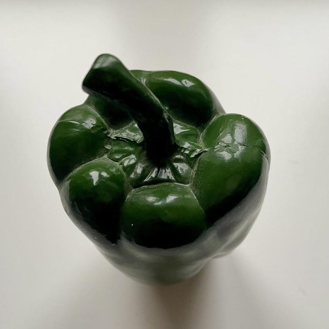 Vintage Czechoslovak plastic green bell pepper, a classic piece of pre-1989 home décor made to brighten kitchen displays.
