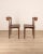 Pair of Danish teak wood chairs with black leather seat. Design Arne Hovmand Olsen, 50s. Conditions: in good condition, it...