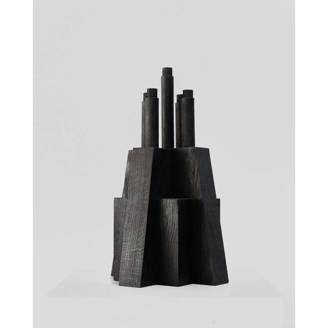 Bunker candle holder by arno declercq materials: burned and waxed oak. Dimensions: w 32 x d 32 x h 50 cm. this piece is...