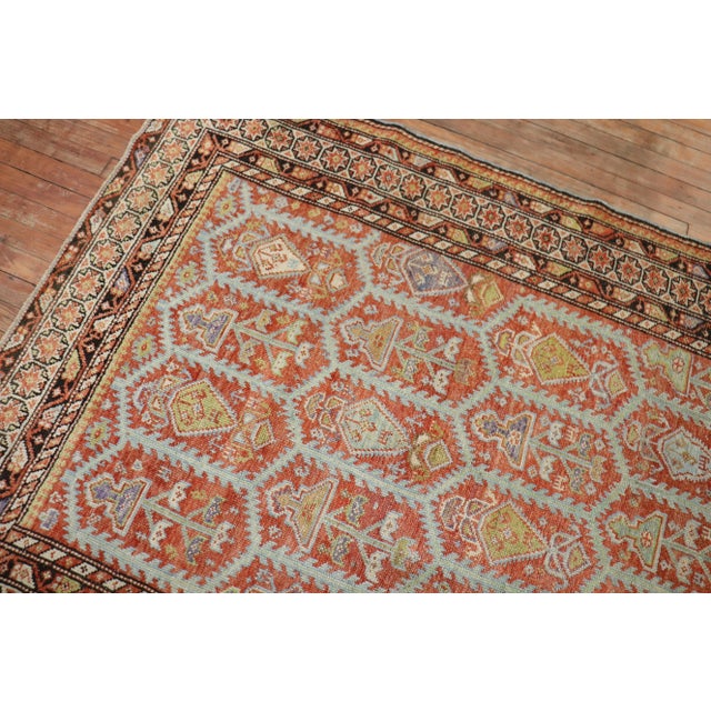 An early 20th Century High Decorative Persian Malayer Rug with an all-over geometric design. Professionally Cleaned and...