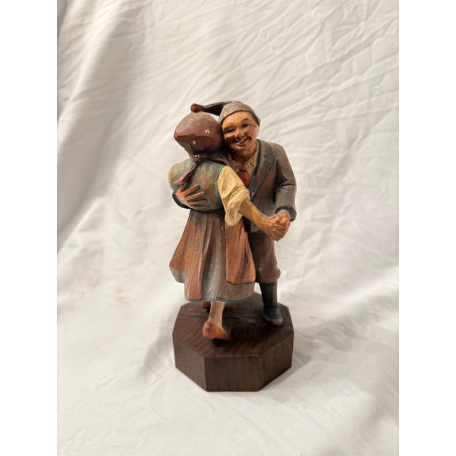 Add rustic European charm to your collection with this beautiful vintage hand-carved wood figurine of an Alpine peasant...