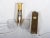 This pair of sconces features brass constructions with pressed glass elements fitted with E14 sockets. It was made in...