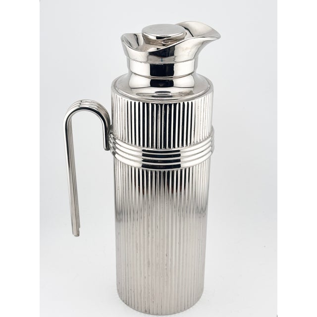 A stunning masterpiece of mid-century luxury, this rare vintage thermal carafe from Christian Dior epitomizes the iconic...