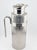A stunning masterpiece of mid-century luxury, this rare vintage thermal carafe from Christian Dior epitomizes the iconic...