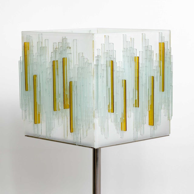 Italian Modernist Art Glass table lamp. Heavy Art Glass shade resting on a chromed metal base. Glass shade has age and...