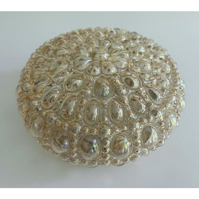 Mid century Limburg sconce / flush Light with amber tint bubble / relief glass shade, bronze enameled base Dimensions...