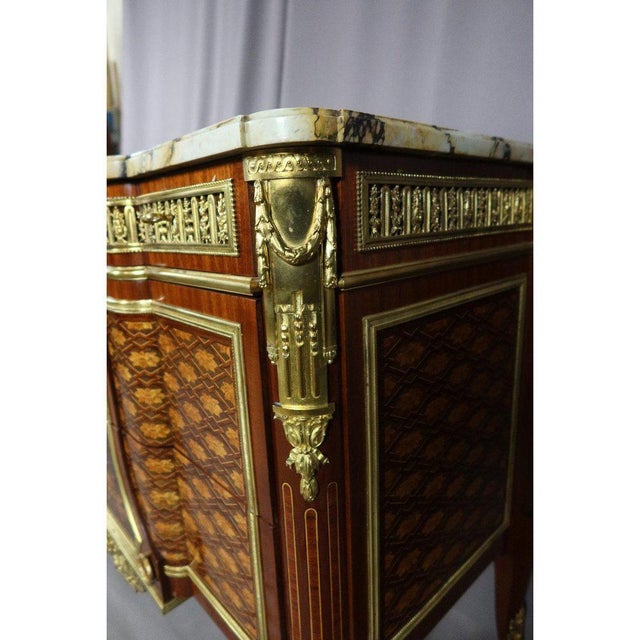 "marquetry dresser after model of riesener" chest of drawers in marquetry from a model of jean-henri riesener (1734-1806)...