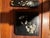 An exquisite antique 2-piece Japanese black lacquer (urushi) desk set featuring delicate hand-painted white...