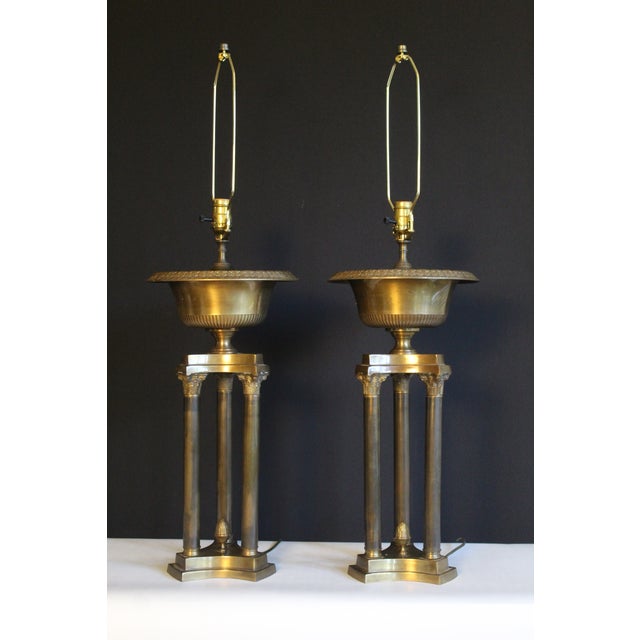 Substantial pair of hand forged Corinthian style table lamps. Light bronze finish giving a rich statement to pieces....