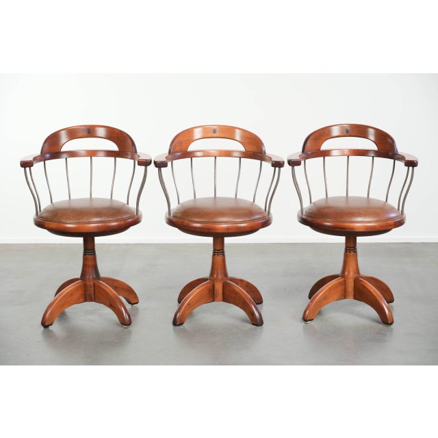 Offered by ByThijs: this set of 3 swivel Schuitema chairs/occasional chairs/office chairs with a cognac-colored cowhide...