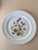These plates depict woodland flowers. There are two of each; purple violas, pink gypsophila, blue vinca and yellow...
