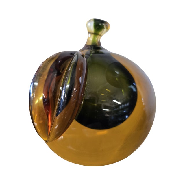gorgeous amber and dark olive heavy glass apple bookends. heavy and impressive enough to stand alone as sculpted pieces....
