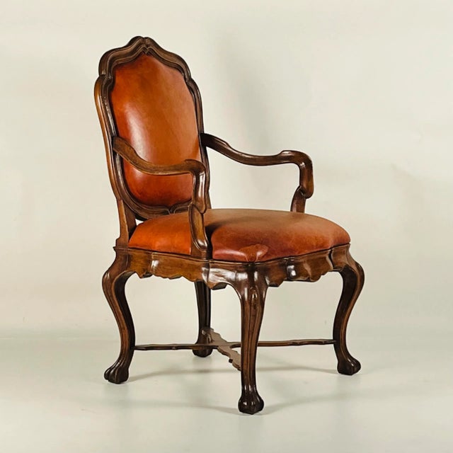 This pair of elegant walnut armchairs by Therien Studio Workshops stands out for the impressive proportions and fine...