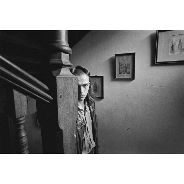 Peter Gabriel English singer, songwriter, record producer Peter Gabriel, styling shaved on front mullet hairstyle, hides...