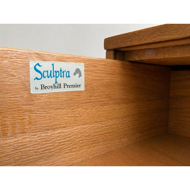 Vintage Broyhill Sculptra highboy in warm walnut. It has a smaller footprint than a long dresser but still gives you five...