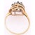14 Karat Yellow Gold Contemporary Ring with Sapphires and Diamonds The prongs are in white gold. 0.12 TDW. Size 6.5 3...