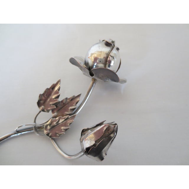 The keepsake silverplate rose and rosebud with leaves will always be blooming and will never wilt. A lovely gift for...