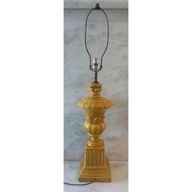 Vintage mid century modern mustard yellow glazed ceramic table lamp featuring a sculptural urn base design associated with...