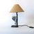 A one-of-a-kind! Our “fragment” lamps are comprised of a carved hardwood corbel mounted on a bespoke black metal stand....