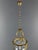 Elegant cylindrical lantern in gilt bronze, adorned with finely chiseled motifs of foliage, ribbons, and pearls. The...