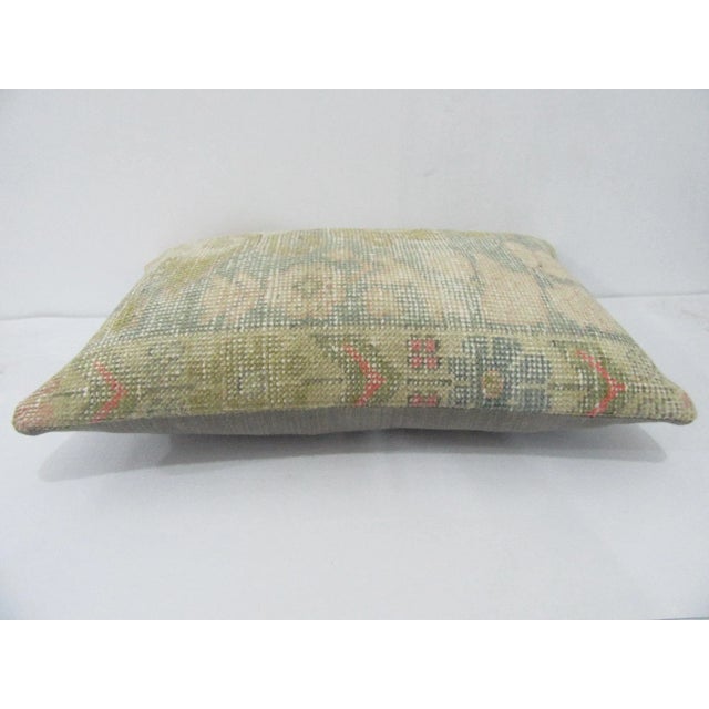 Decorative pillow cover made from a vintage Turkish handknotted rug. Backed with good quality cotton fabric. Pillow...