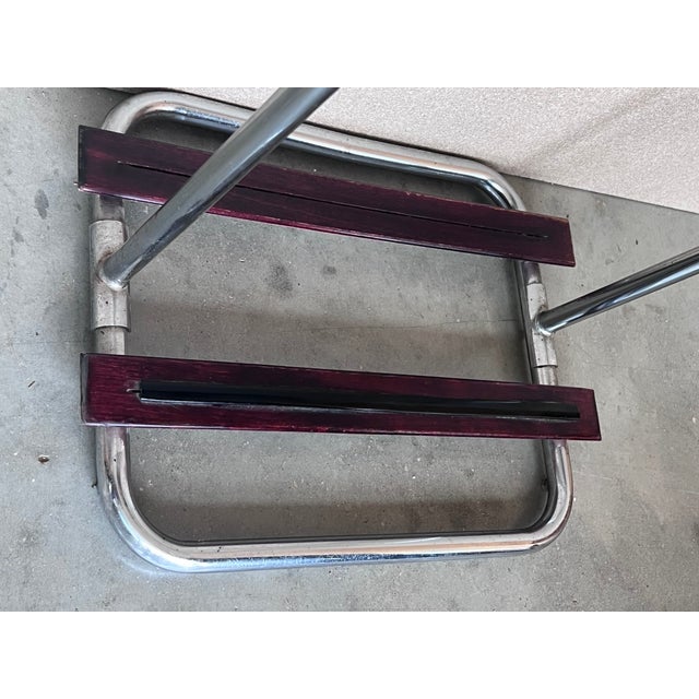 Ultra-rare mid-century beech wood and brass suit rack valet. This marvellous item was designed and produced during the...