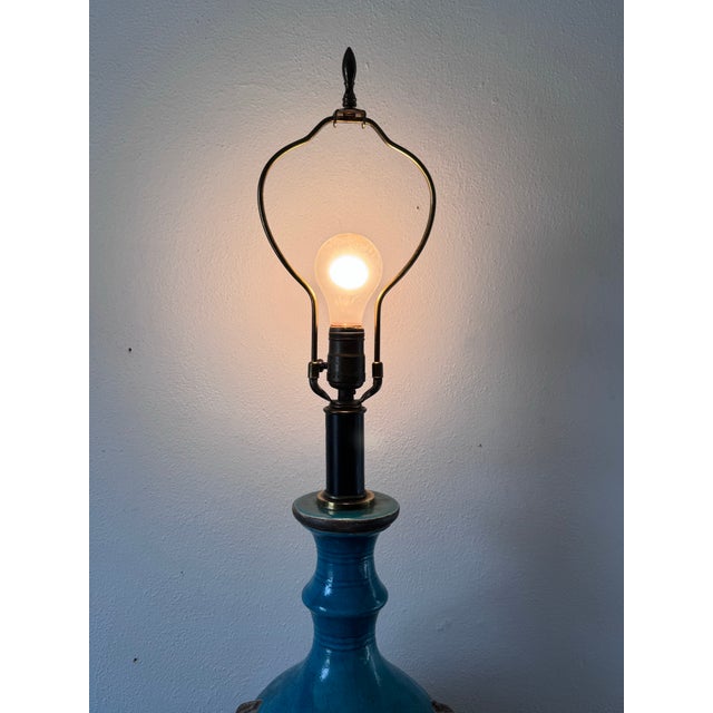 This striking Ming-style Italian ceramic table lamp attributed to Ugo Zaccagnini, features a bold, sculptural form...