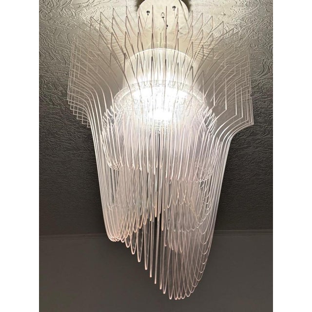 "zaha hadid chandelier" parent slamp: zaha hadid's dynamic and visionary architecture translates into a seemingly...