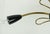 Beautiful Sputnik ceiling light from the 1950s. It is made of brass with black accents. It features a total of five arms...