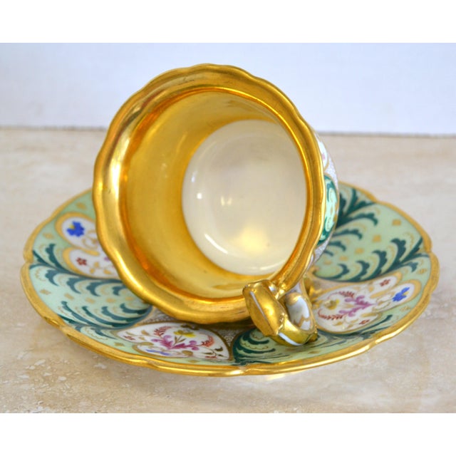 Vintage Gilded Tea Cup with Handle, Hand-painted Art Deco. Marked and Numbered underneath. In very good vintage condition....