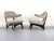 This elegant pair of armchairs from the 1950s captivates with its delicate design and the harmonious combination of...