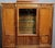 An important display cabinet in fine woods and marquetry, stamped a. Bastet, lyon, remarkable for the richness of its...