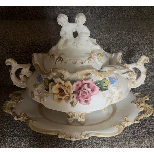 Bring timeless European-inspired elegance to your home with this exquisite vintage Capelli porcelain covered centerpiece...