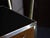 This Italian dry bar, inspired by Gio Ponti's iconic 1950s style, is a stunning piece of mid-century modern furniture....