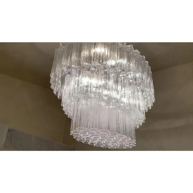 Contemporary and huge trasparent “tronchi” oval chandelier luxury and scenographic contemporary chandelier made in murano...