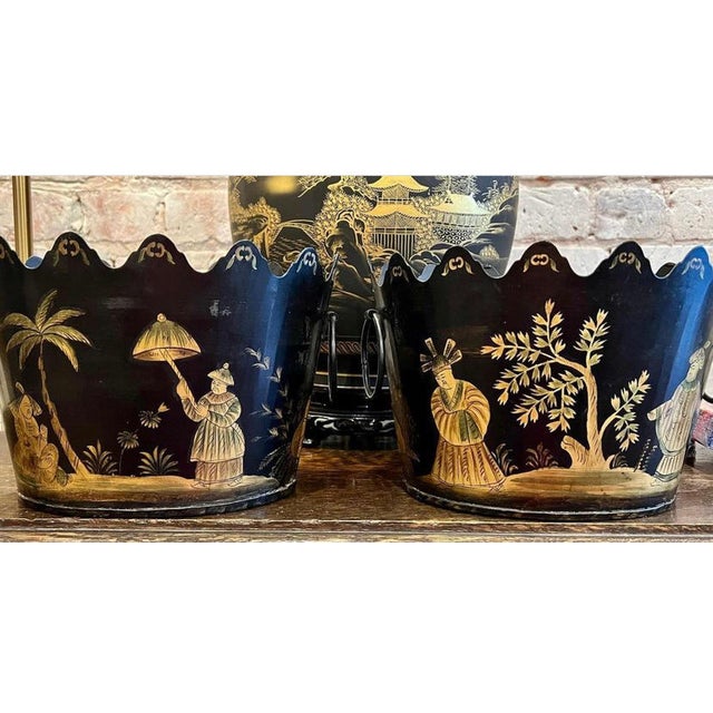 Gorgeous pair of vintage black and gold tole cachepots. 9" Wide x 6" Tall.
