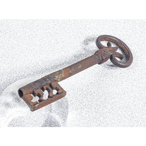 Antique lock with key in forged and wrought iron. 18th-19th century. Period 18th-19th century. Materials forged and...