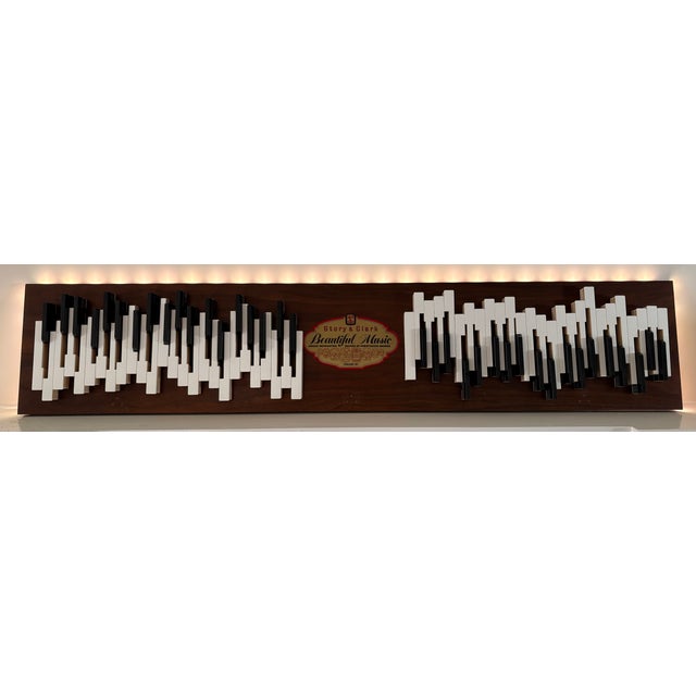 This custom wall sculpture was handcrafted from my 1980s Story & Clark piano. The piano was no longer playable. Rather...