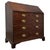 A handsome 18th century English Georgian bureau, finely constructed in oak and combining an elegant fall-front writing...