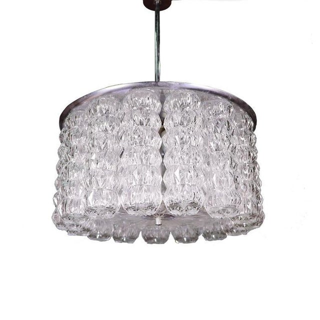 Elegant drum chandelier with circular glass tubes on a chromed frame. Designed by j.t. Kalmar, austria in the 1950s....