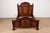 A gorgeous antique Victorian full size bed frame In the manner of Herter Brothers USA, Circa 1880s Carved walnut, with...