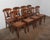 French Provincial Late 20th Century Set of Eight Neoclassical Style Cherry Dining Chairs With Cane Seats and Saber Legs For Sale - Image 3 of 7