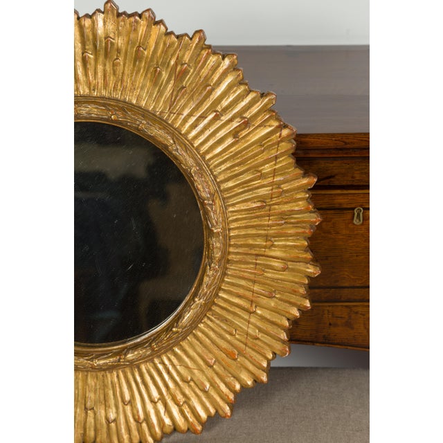 French Midcentury Giltwood Sunburst Mirror with Radiating Rays and Carved Frame For Sale - Image 9 of 11