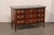 A French marble top commode, with beautiful inlay, book-match veneers and rococo style hardware, from the 19th century....