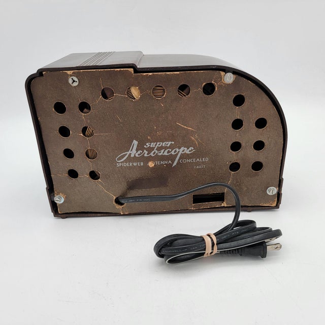 This vintage Admiral Bakelite radio is a nostalgic piece for any collector. Featuring a timeless design with an integrated...