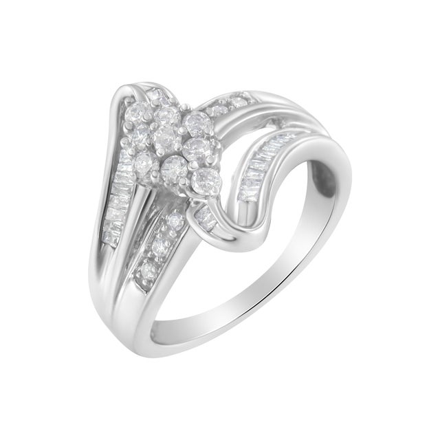 Crafted in lustrous 10k white gold, this bypass ring showcases a dazzling round diamond cluster. Soft ribbons split from...