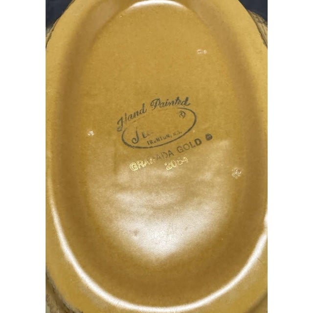 The Stangl Pottery Scallop Pumpkin Painted 22k Gold Bowl from the 1960s is a vintage piece of Mid-Century Modern decor....